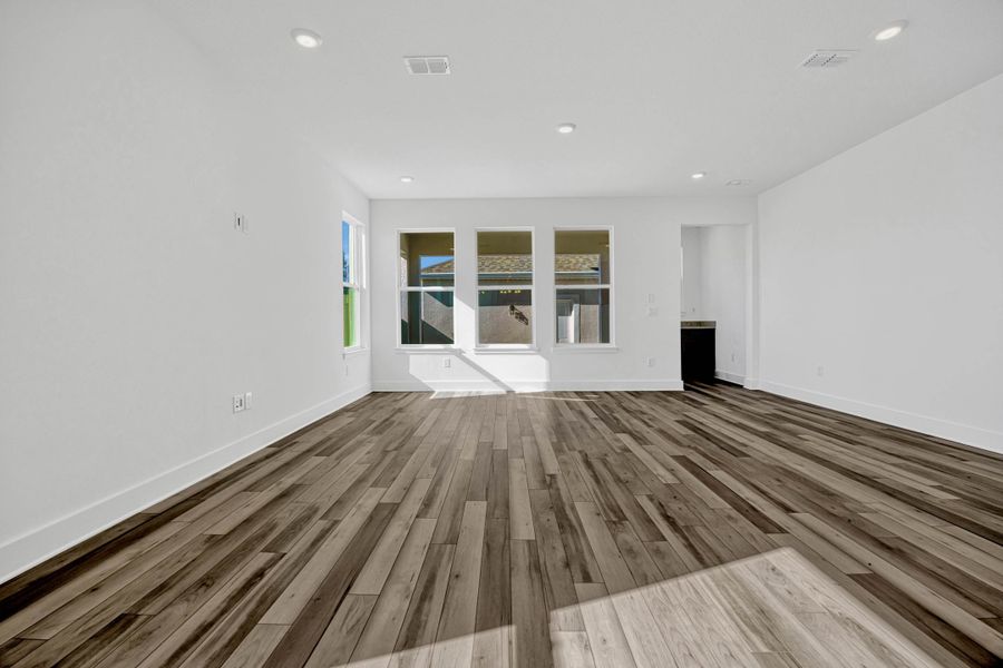 Representative unfurnished interior of a home built from the Whitney by Rockwell Homes in Harvest at Ovation - Townhomes, Winter Garden (Image 13). Representative unfurnished interior of a home built from the Whitney by Rockwell Homes in Harvest at Ovation - Townhomes, Winter Garden (Image 13).