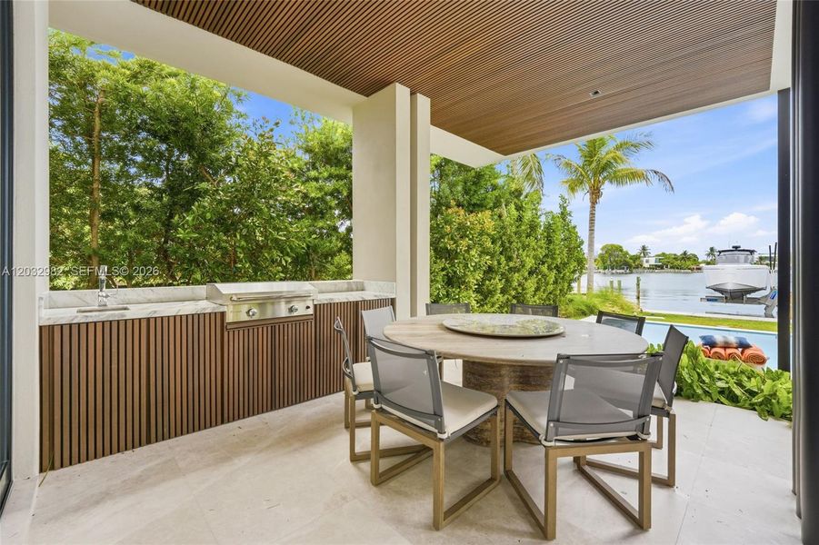 Exterior details and patio area of a home in , Miami Beach (Image 24). Exterior details and patio area of a home in , Miami Beach (Image 24).