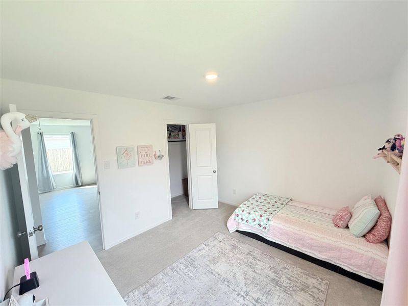 Secondary bedroom with large closet. Secondary bedroom with large closet.