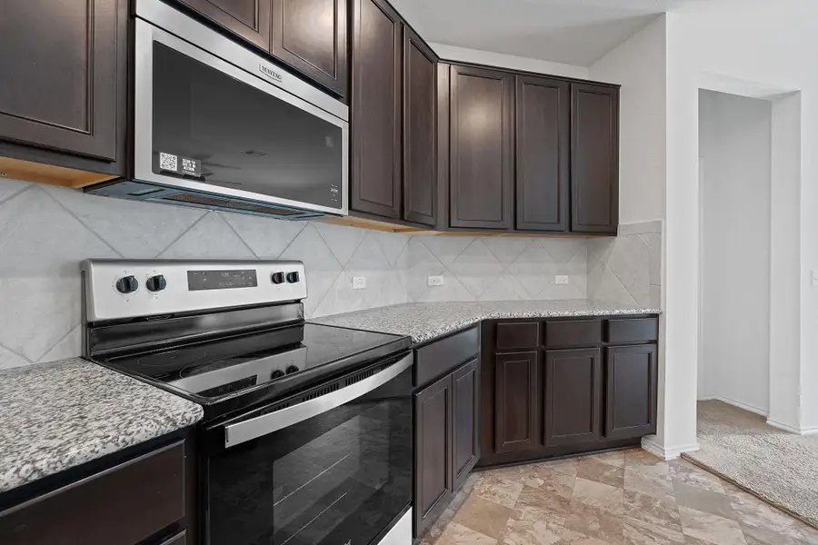 Furnished interior view inside a new home in EastVillage - Heritage Collection, Manor (Image 4). Furnished interior view inside a new home in EastVillage - Heritage Collection, Manor (Image 4).