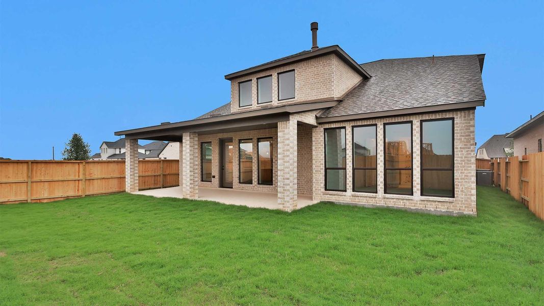 Exterior details and patio area of a home in Midline, Houston (Image 2).