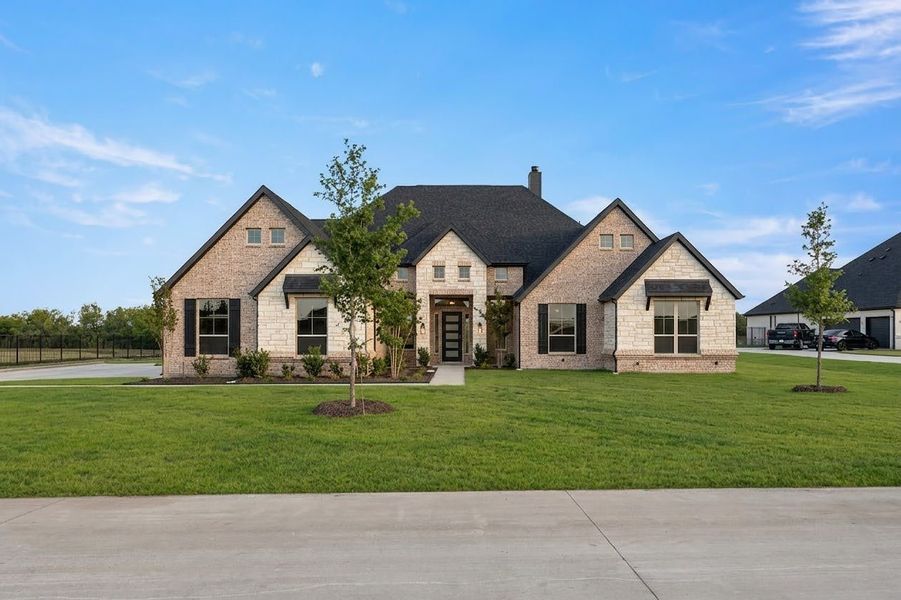 Representative exterior photo of a completed home built from the Sperry by Kindred Homes in Oak Creek Ranch, Waxahachie, TX (Image 27).