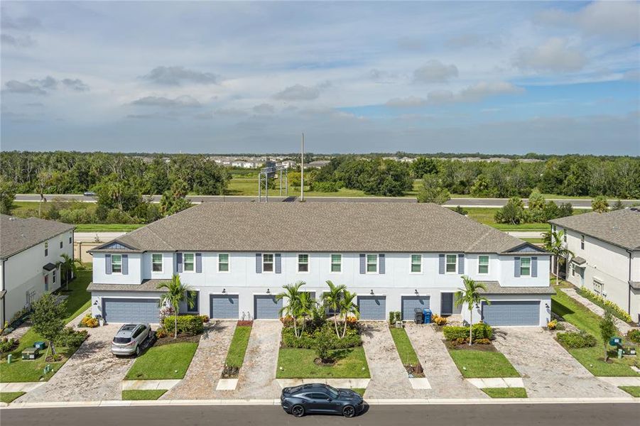 Front exterior of a new home in , Palmetto, FL, highlighting curb appeal (Image 26).