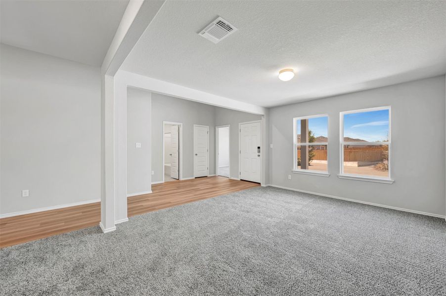 Spacious, unfurnished interior of a new home in Carillon, Manor (Image 35).
