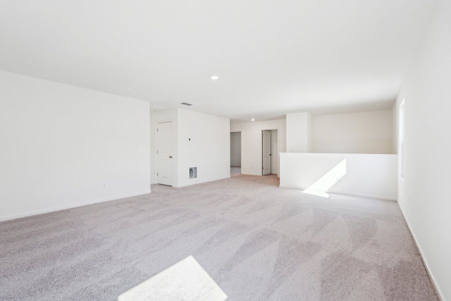 Representative unfurnished interior of a home built from the Eris by Starlight Homes in Brookshire at Legacy Hills, Celina (Image 22). Representative unfurnished interior of a home built from the Eris by Starlight Homes in Brookshire at Legacy Hills, Celina (Image 22).