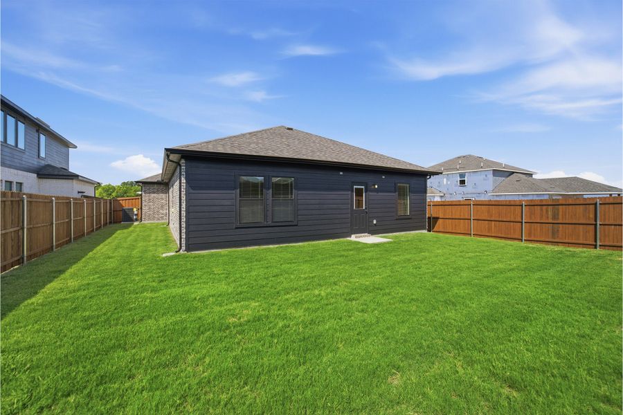 Exterior details and patio area of a home in Heartland, Crandall (Image 4).