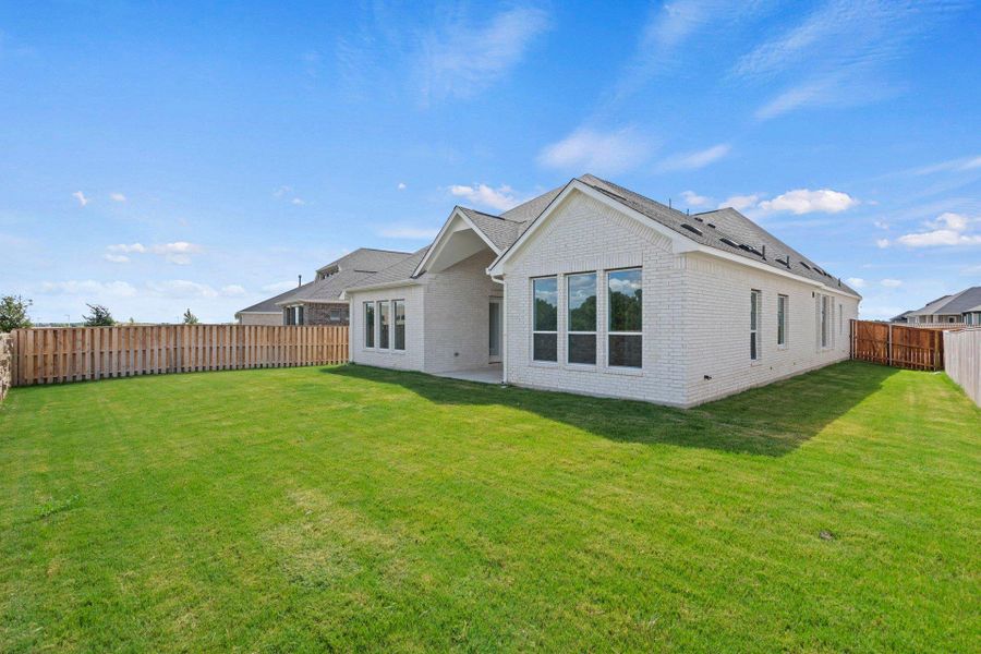 Rear of Home and Private Backyard