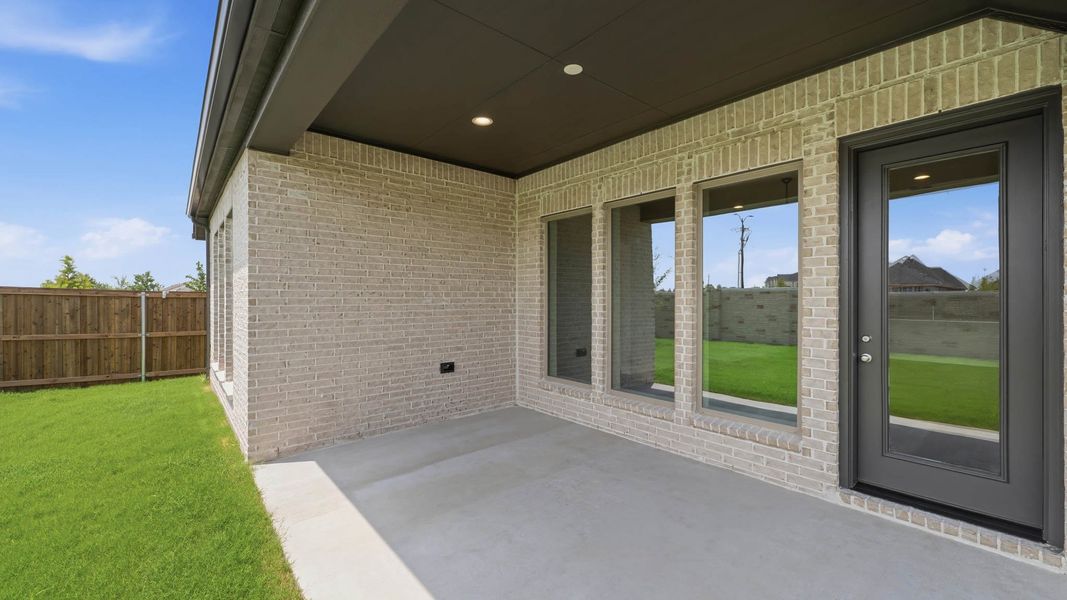 Exterior details and patio area of a home in Trinity Falls, McKinney (Image 4).