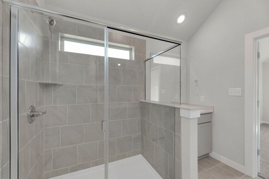 Primary Bathroom in the Pecos home plan by Trophy Signature Homes – REPRESENTATIVE PHOTO