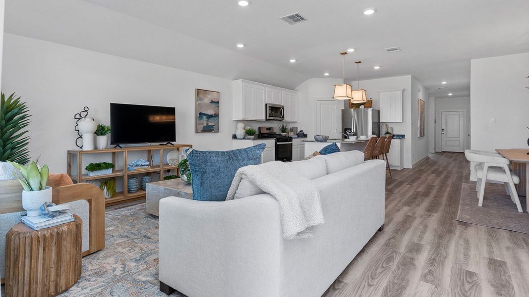 Furnished interior view inside a new home in Caldwell Crossing, Iowa Colony (Image 7).