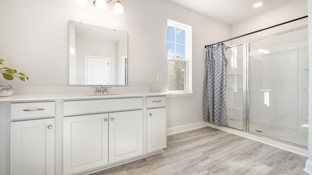 Furnished interior view inside a new home in Brunswick Plantation, Ash (Image 11).