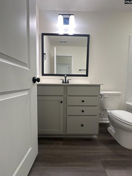 Furnished interior view inside a new home in Piney Woods Bluff, Columbia (Image 5).
