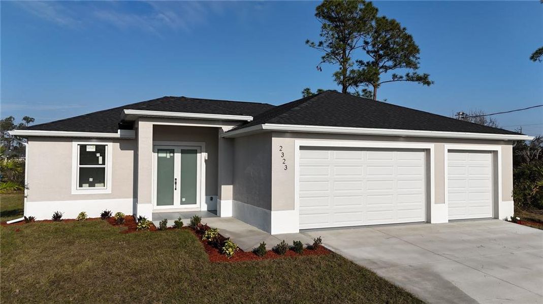 Front exterior of a new home in , North Port, FL, highlighting curb appeal (Image 13).