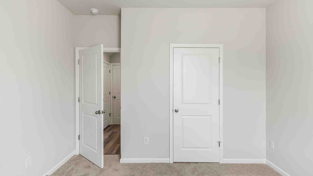 Spacious, unfurnished interior of a new home in Cedar Hill Landing, Navassa (Image 22). Spacious, unfurnished interior of a new home in Cedar Hill Landing, Navassa (Image 22).