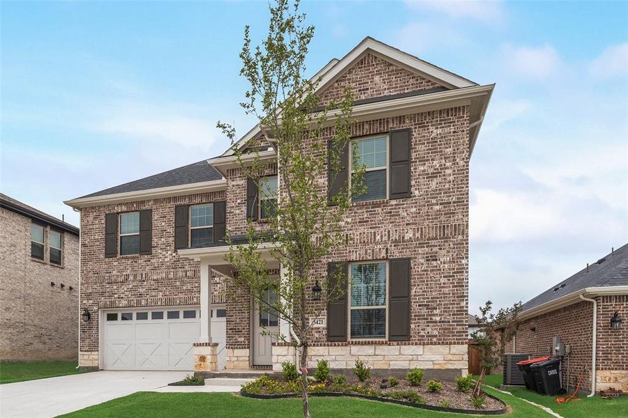 Front exterior of a new home in Villages of Hurricane Creek, Anna, TX, highlighting curb appeal (Image 18).