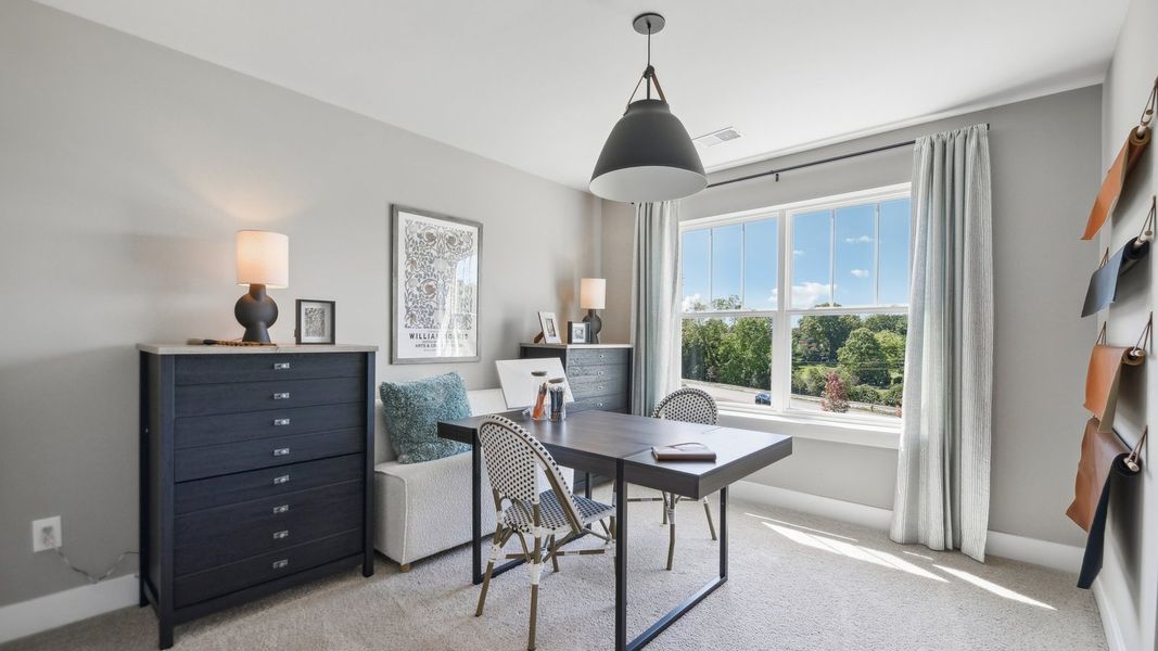 Representative furnished interior of a home built from the Jamestown by D.R. Horton in Fountain View, Ormond Beach (Image 36).