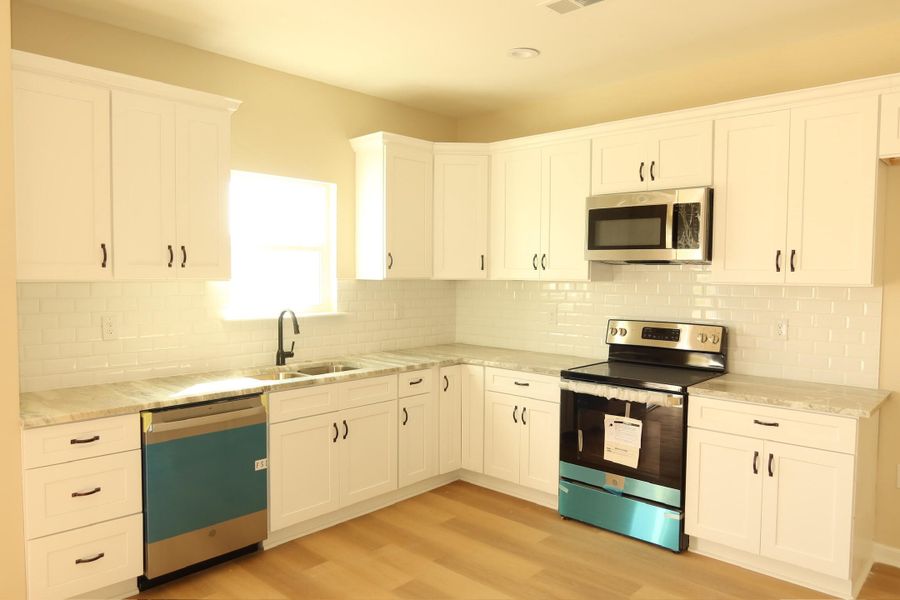 Furnished interior view inside a new home in , Santee (Image 8).