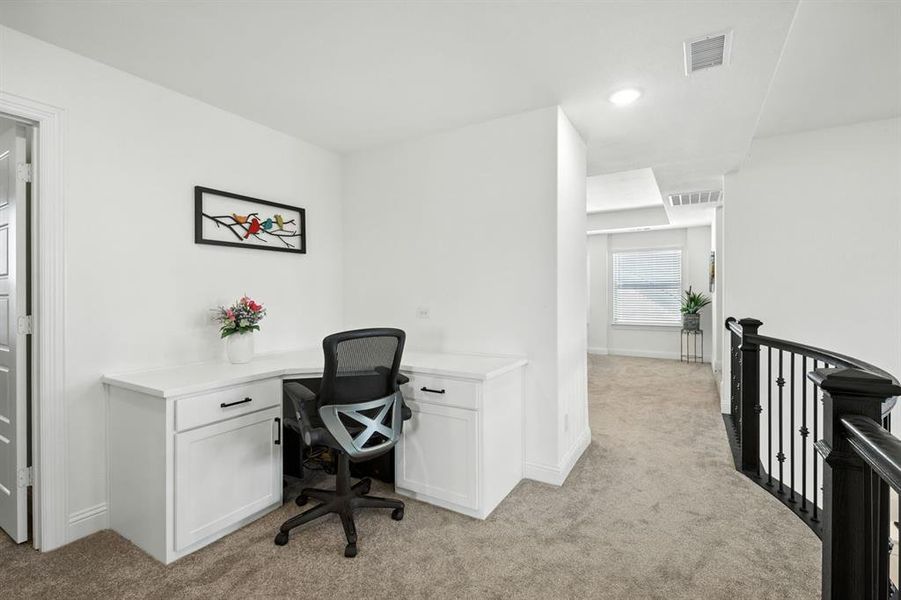 Built-in office desk upstairs hallway.