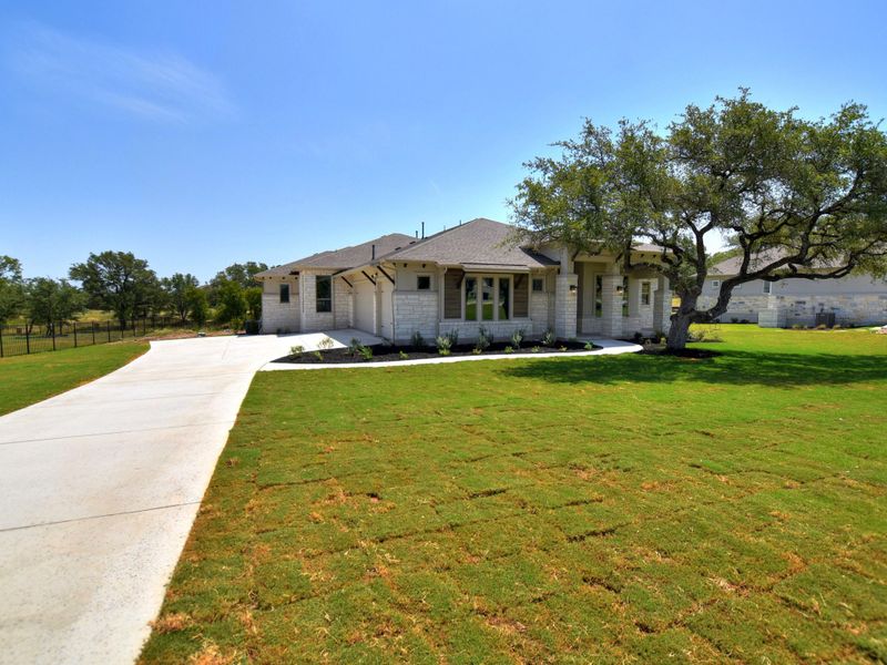 Representative exterior photo of a completed home built from the Siena III by Giddens Homes in Clearwater Ranch, Liberty Hill, TX (Image 33).