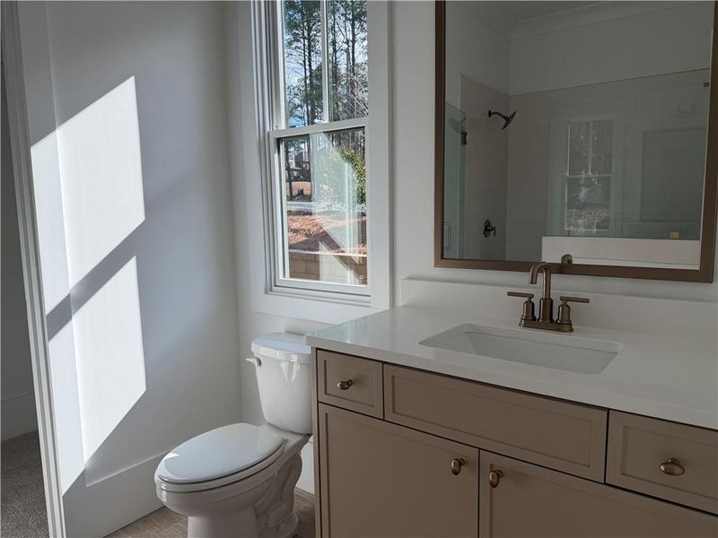 Furnished interior view inside a new home in Woodford, Acworth (Image 10).