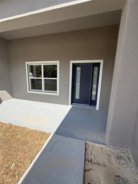 Exterior details and patio area of a home in , Citrus Springs (Image 20).