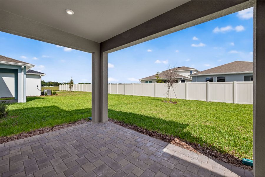 Exterior details and patio area of a home in Crosswind Ranch, Parrish (Image 2).
