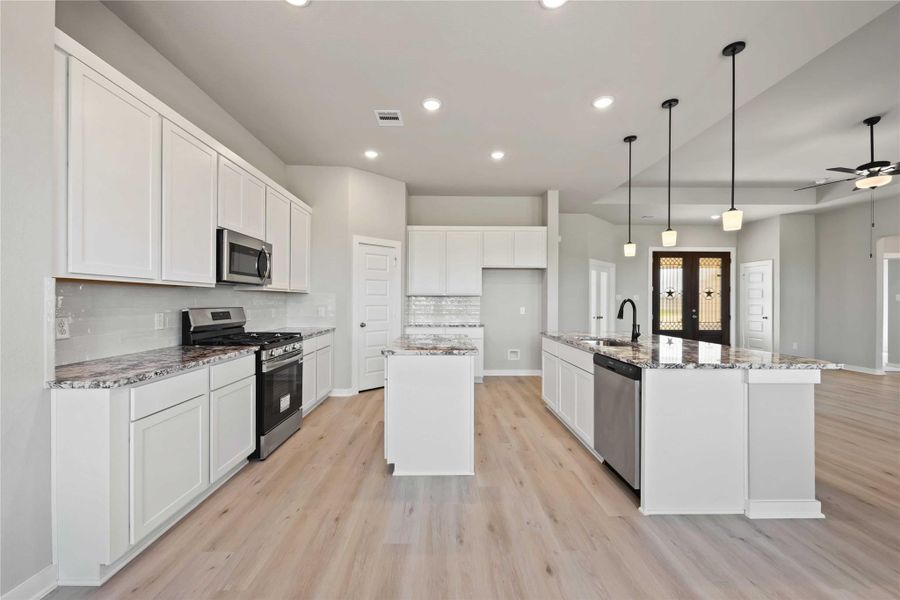 Furnished interior view inside a new home in Blue Heron Estates, Beasley (Image 5).