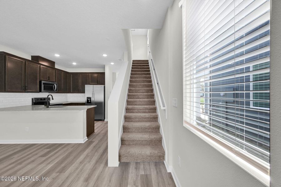 Furnished interior view inside a new home in Baxley Villas, Middleburg (Image 5).