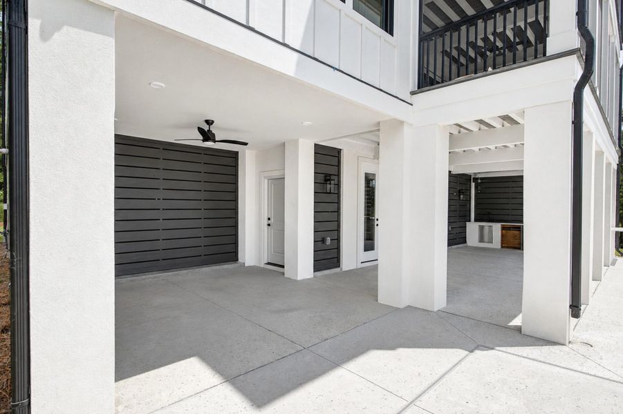 Exterior details and patio area of a home in , Awendaw (Image 19).