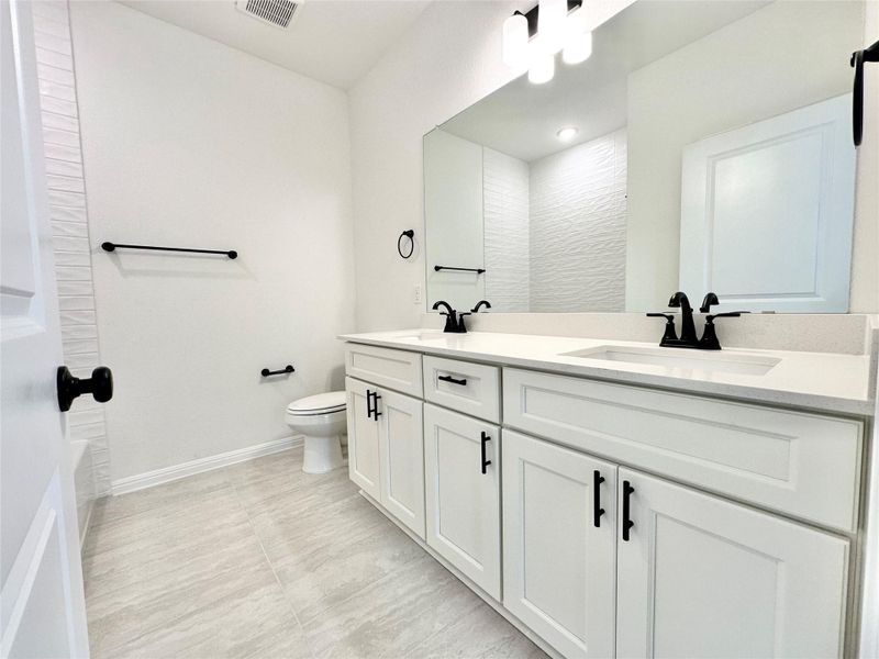 Furnished interior view inside a new home in Sage Hollow, Kyle (Image 8).