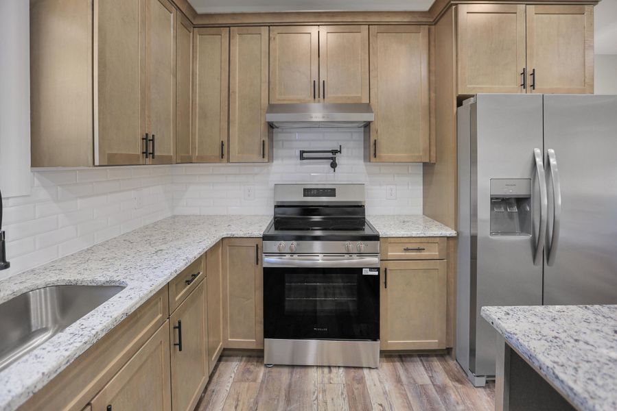 Furnished interior view inside a new home in , St. Stephen (Image 7).