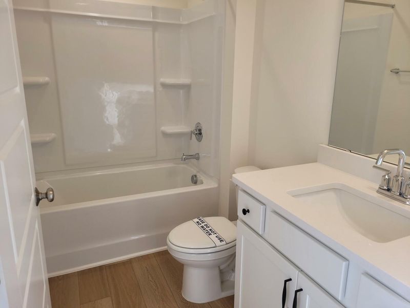 Furnished interior view inside a new home in 1158 Place Townhomes, Wilson (Image 7).