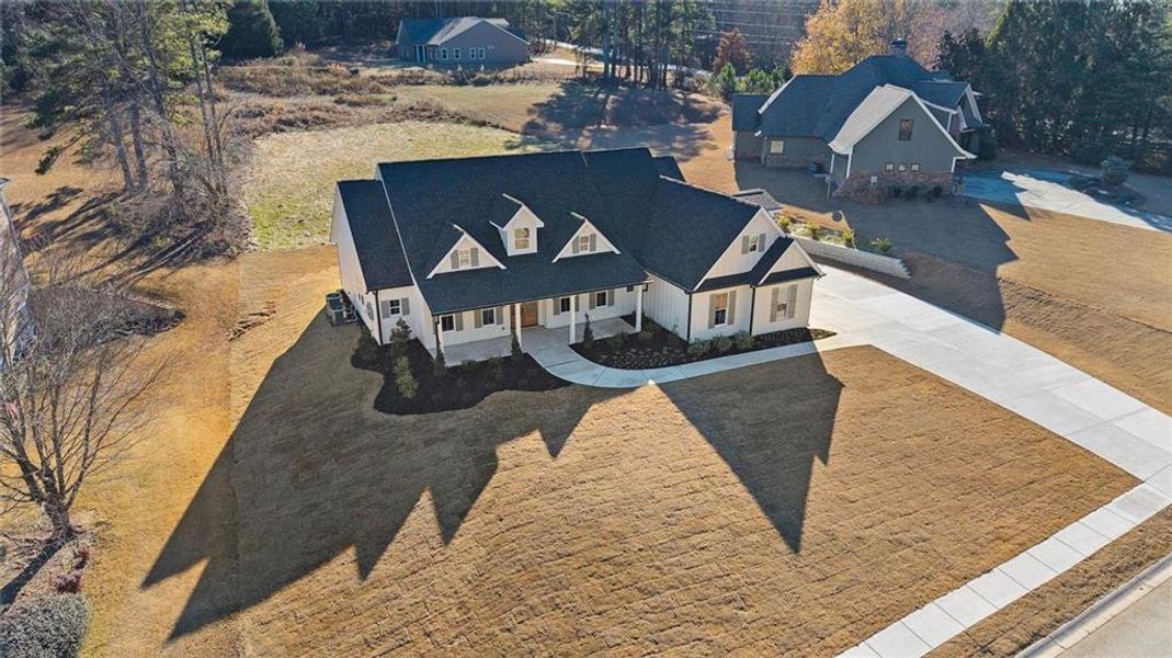 Front exterior of a new home in , Carrollton, GA, highlighting curb appeal (Image 16).