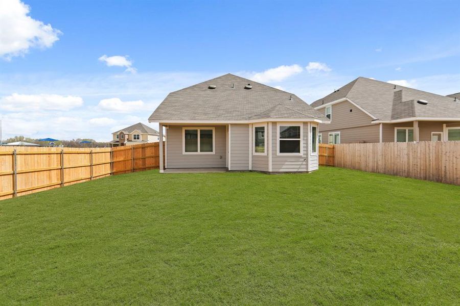 Exterior details and patio area of a home in Retreat at Fossil Creek, Fort Worth (Image 2).