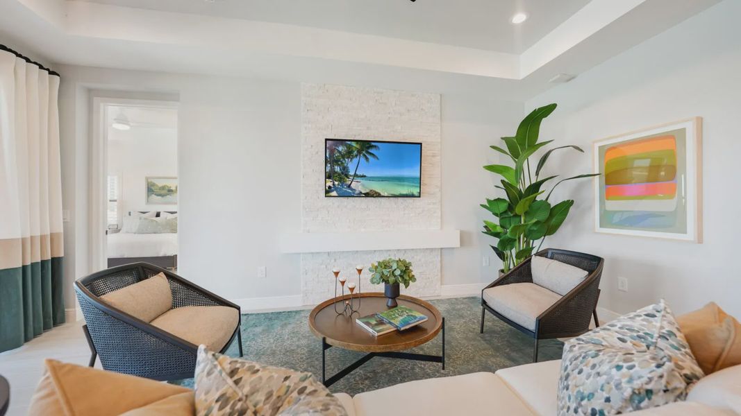 Representative furnished interior of a home built from the Meadow Brook by Neal Communities in SkySail, Naples (Image 15).