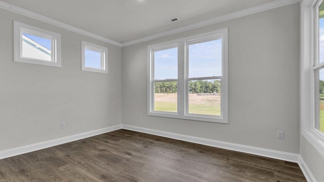 Representative unfurnished interior of a home built from the LAWSON by D.R. Horton in Eagle Creek, Fuquay Varina (Image 11).