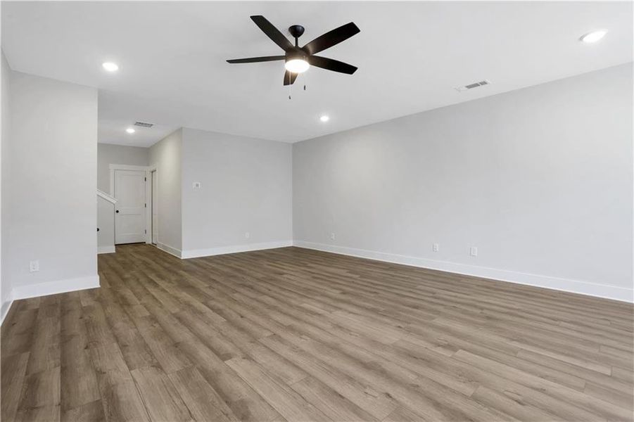 Spacious, unfurnished interior of a new home in Cambridge, Flowery Branch (Image 44).
