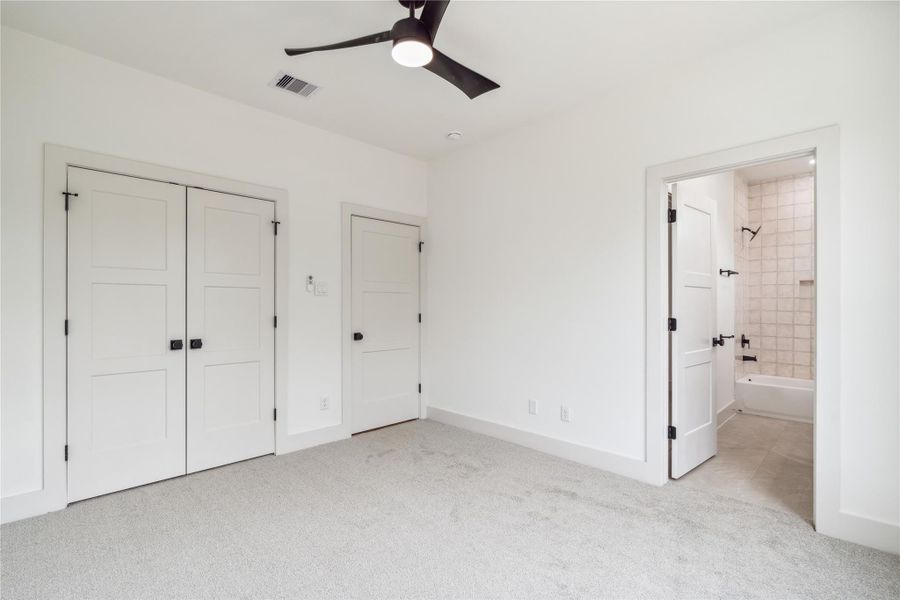 Complete with its own ensuite bath, this secondary bedroom offers a perfect retreat for guests or family alike. Complete with its own ensuite bath, this secondary bedroom offers a perfect retreat for guests or family alike.
