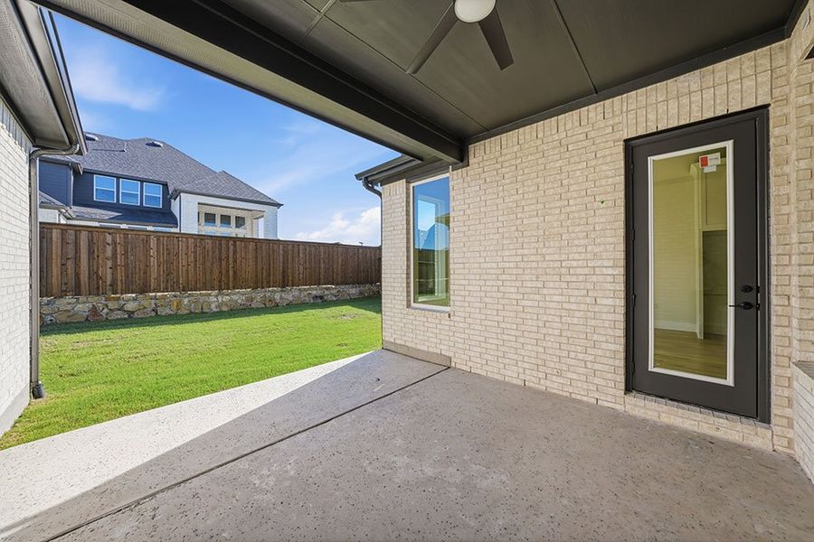 Exterior details and patio area of a home in Quail Hollow, Rockwall (Image 3).