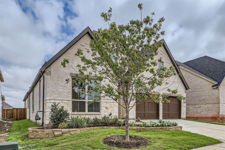 View of front of house with a front lawn