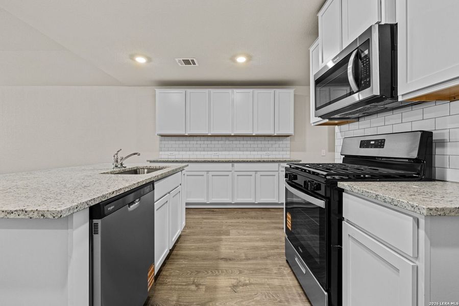Furnished interior view inside a new home in Redbird Ranch, San Antonio (Image 5).