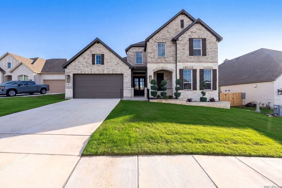 Front exterior of a new home in Ventana, Bulverde, TX, highlighting curb appeal (Image 29).