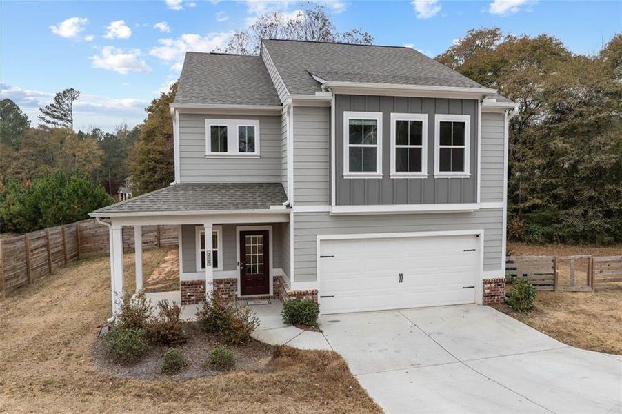 Front exterior of a new home in , Auburn, GA, highlighting curb appeal (Image 23).