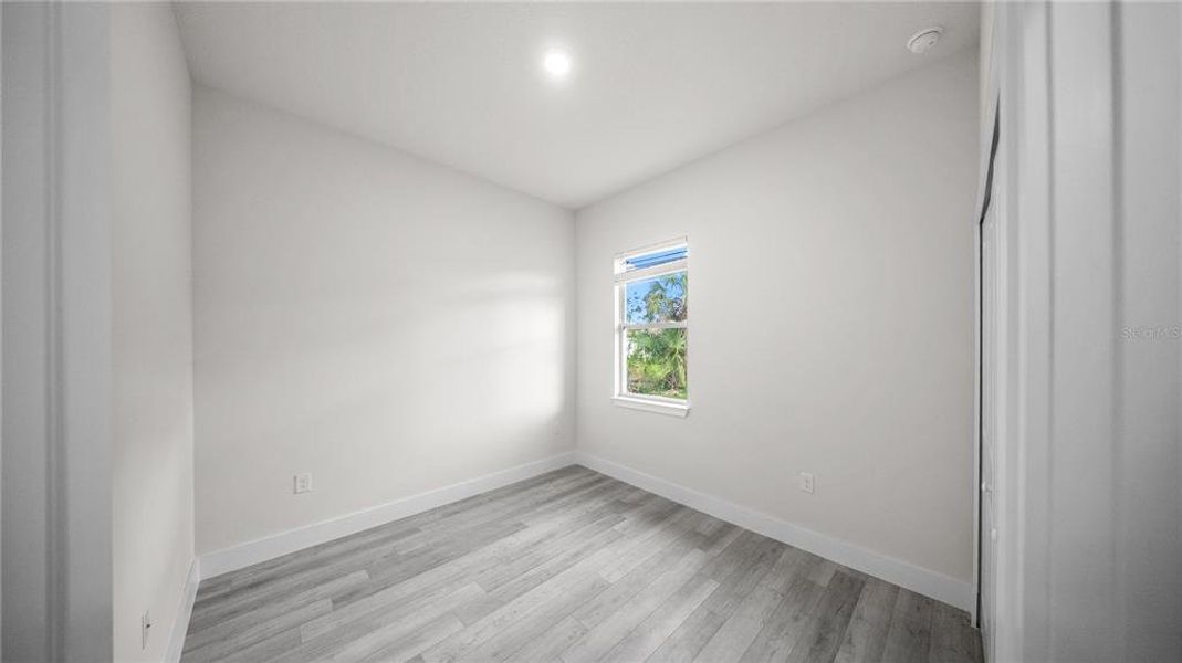 Spacious, unfurnished interior of a new home in , Port Charlotte (Image 16).