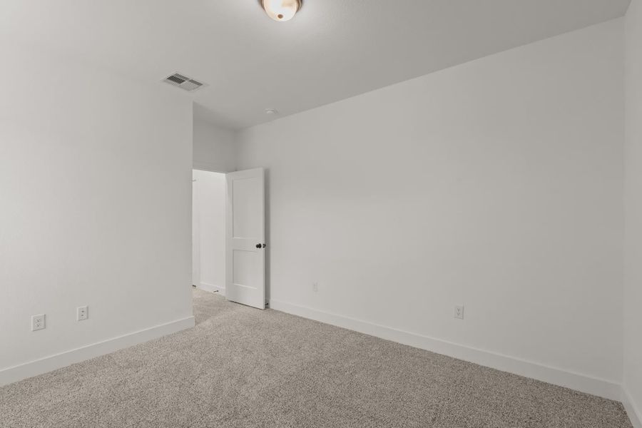 Representative unfurnished interior of a home built from the Sorenstam by Chesmar Homes in Riceland Alley Loads, Mont Belvieu (Image 79).