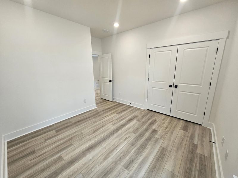 Spacious, unfurnished interior of a new home in Creekside at Andrews, Summerville (Image 17).