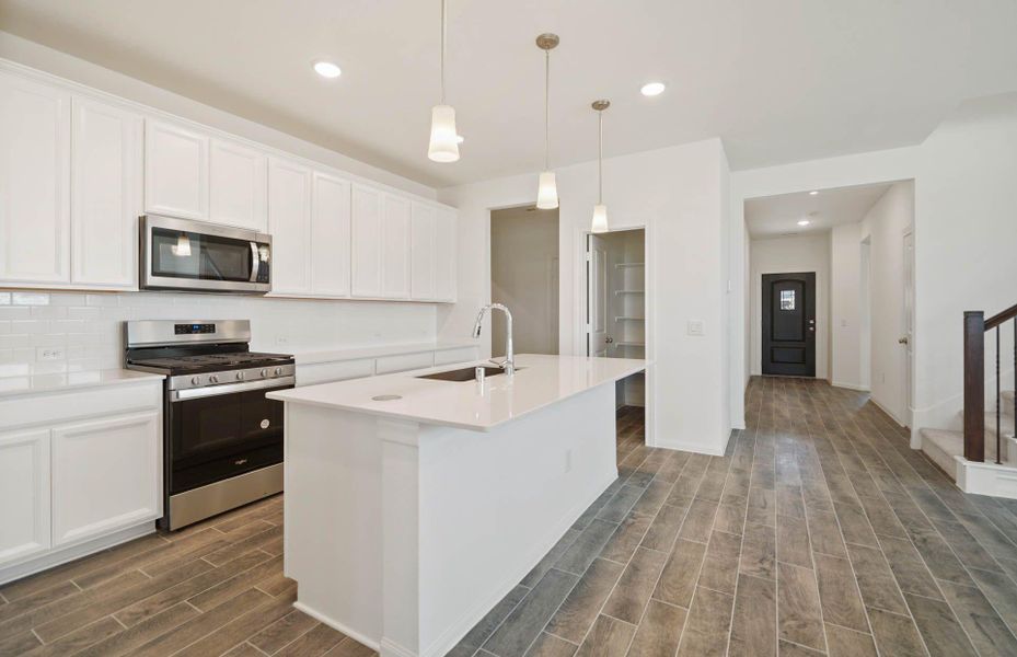 Furnished interior view inside a new home in Mavera, Conroe (Image 4).