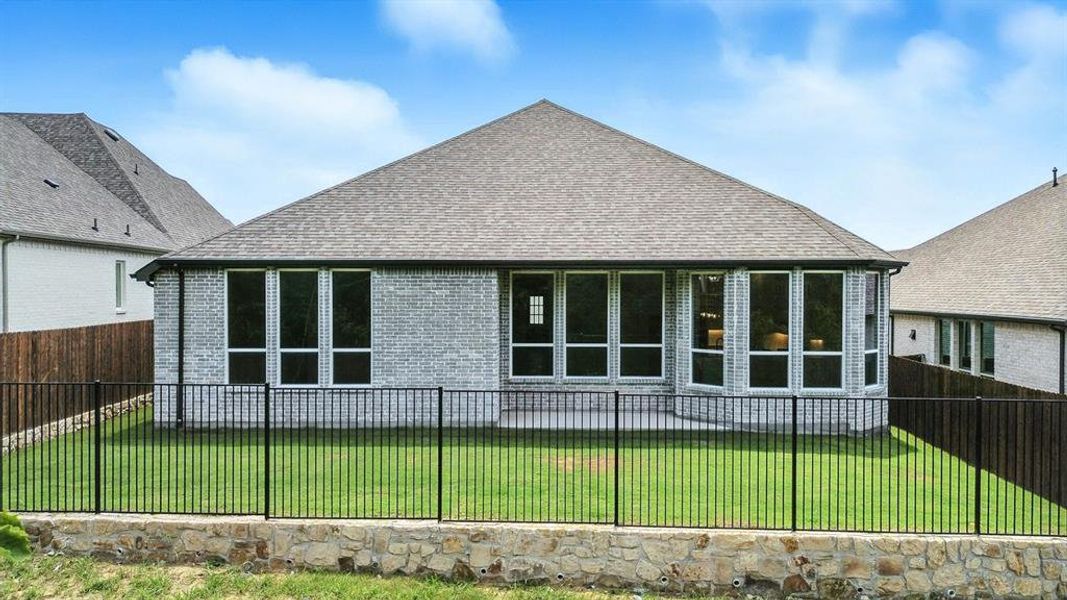 Front exterior of a new home in Thompson Farms: 60ft. lots, Van Alstyne, TX, highlighting curb appeal (Image 2). Front exterior of a new home in Thompson Farms: 60ft. lots, Van Alstyne, TX, highlighting curb appeal (Image 2).