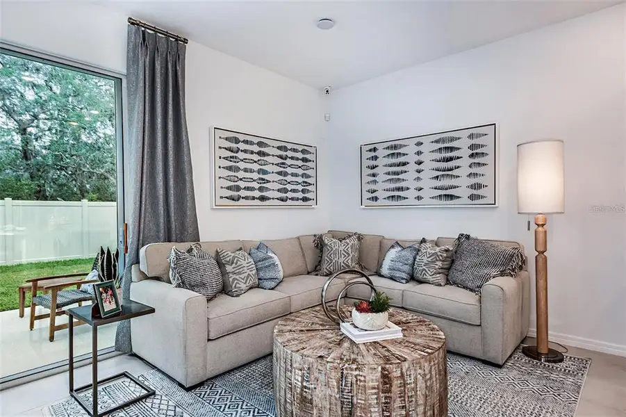 Furnished interior view inside a new home in The Townhomes at Anthem Park, St. Cloud (Image 12).