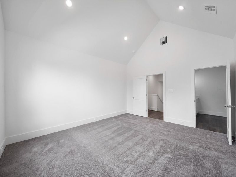 Experience modern elegance in this spacious, light-filled room, perfectly showcasing the quality and style of the community's floor plans.Photo Disclaimer: Photos are representative of the community and may depict a similar floor plan, model home, or previously completed residence.